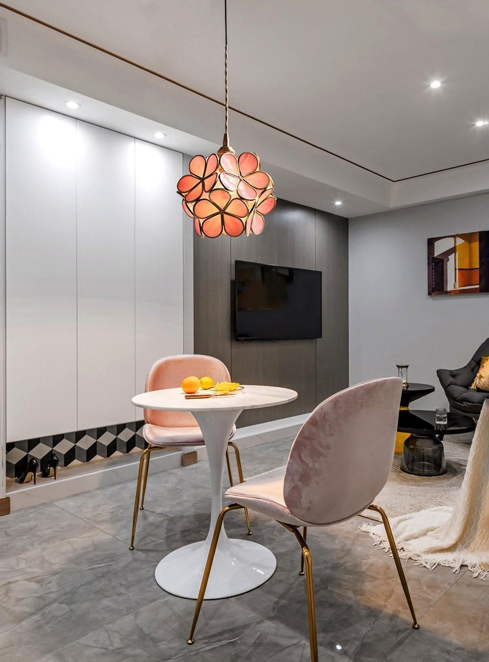 A pink flower shape pendant lamp suspension on the living room