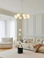Cozy room with a sofa and a green chandelier